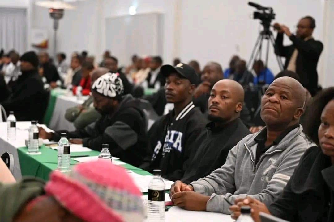 LSTA members seated and listening at a public inquiry on scholar transport